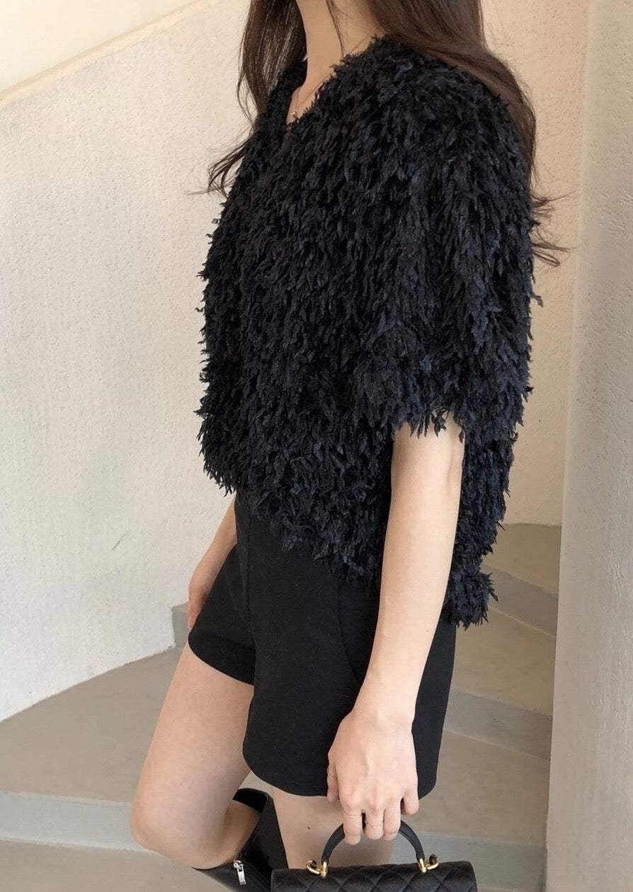 Feathered V-neck top