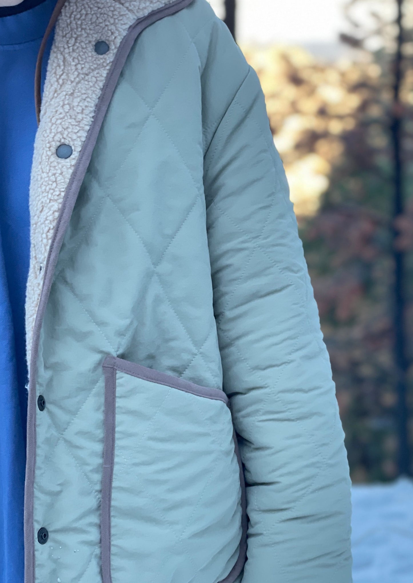 Reversible Quilted Nylon / Faux shearling Jacket