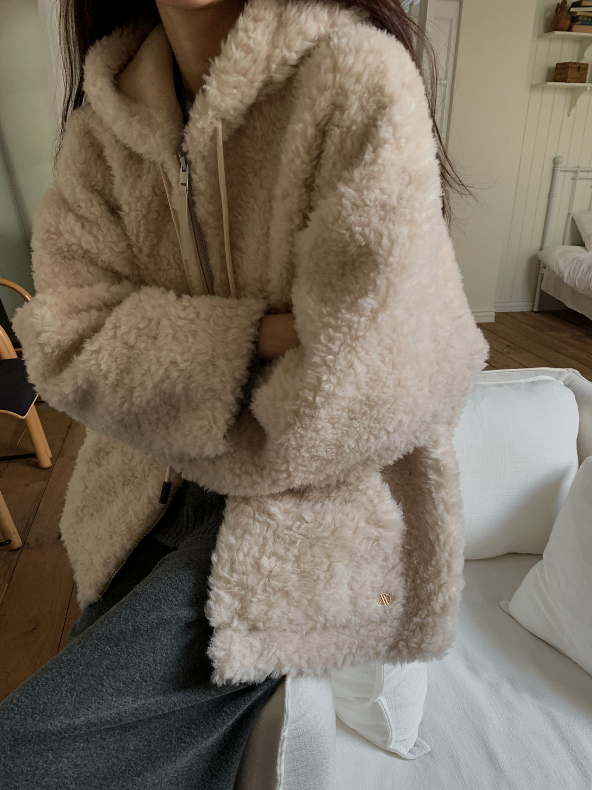 Faux Shearling Zip Up Jacket with a Hood