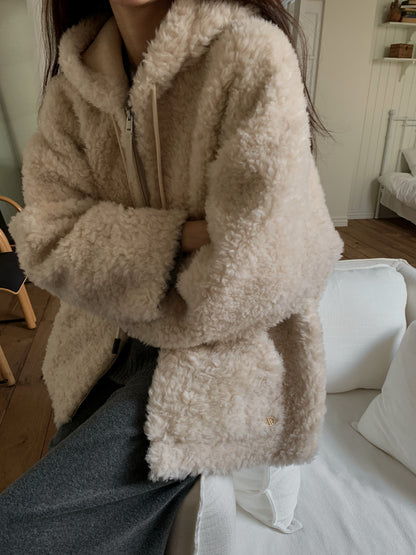 Faux Shearling Zip Up Jacket with a Hood